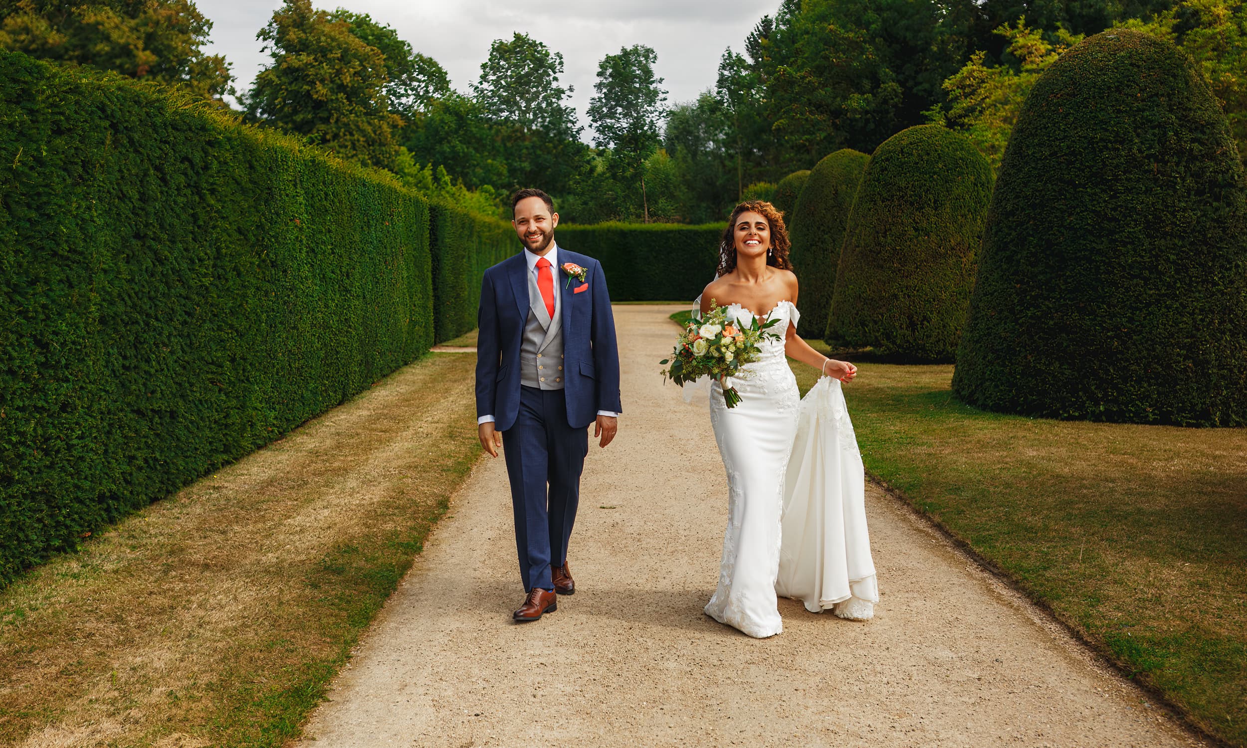 Groom hugs bride on boat
