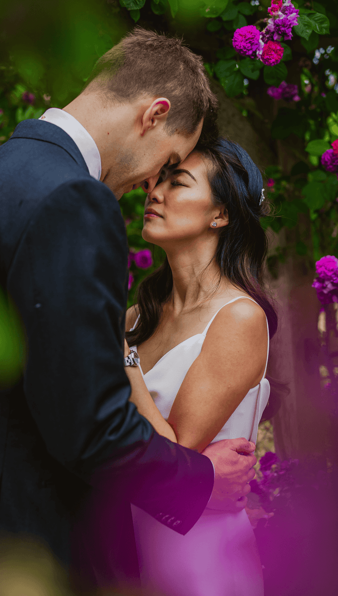 bride and groom walking holding hands